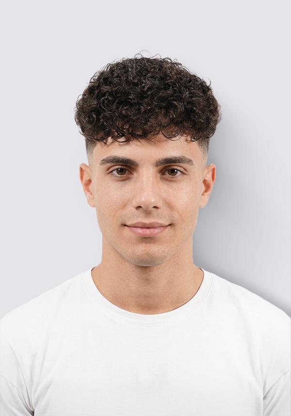 Prótesis capilar de skin con permanente en el cabello. Rizo de 10mm. cabello natural y realista