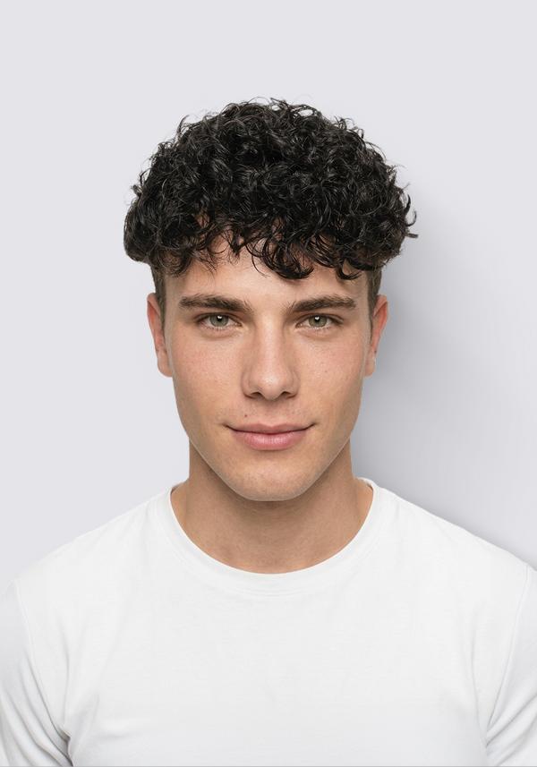 Prótesis capilar de skin con permanente en el cabello. Rizo de 20mm. cabello natural y realista