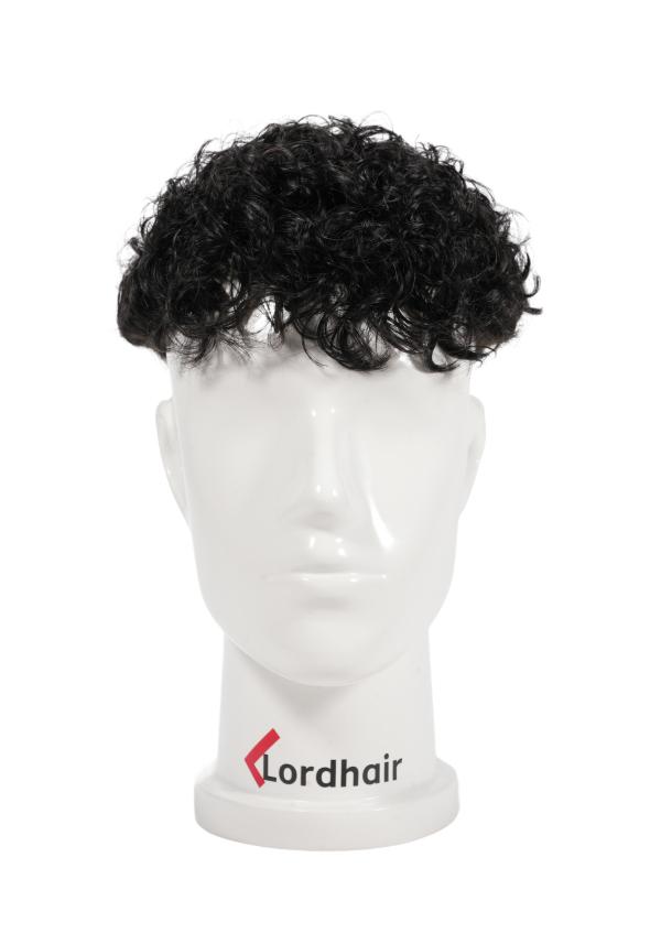 Prótesis capilar de skin con permanente en el cabello. Rizo de 20mm. cabello natural y realista